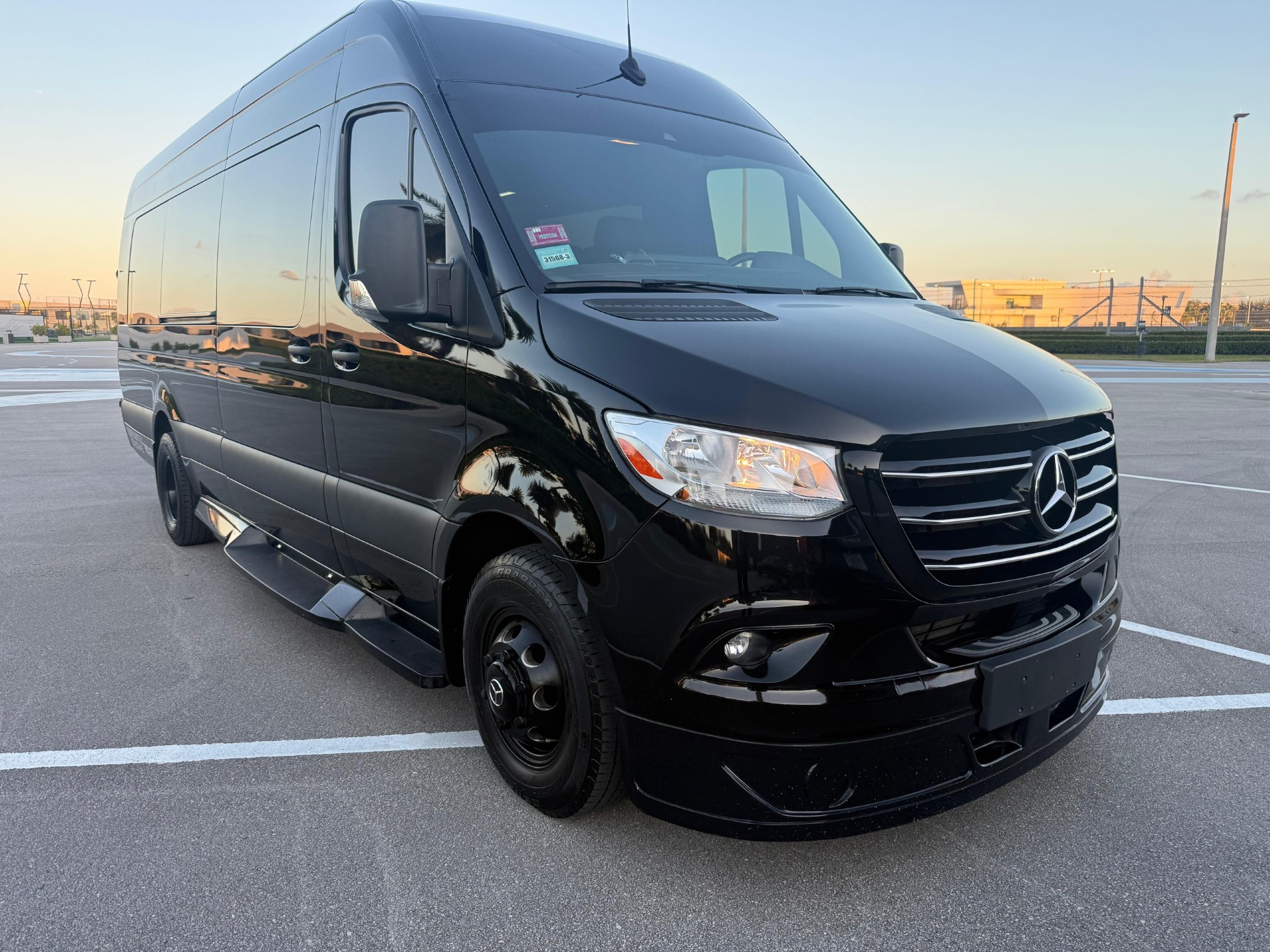 Black Mercedes-Benz Sprinter executive van